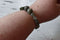 Essential Evergreen Bracelet on wrist men's handmade beaded bracelets from your premier jewelry dealer